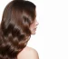 best hair spa singapore, woman with flowing brunette hair.